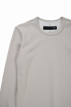Load image into Gallery viewer, A.F ARTEFACT BOMBER HEAT® SOLID LS TOPS (IVORY)