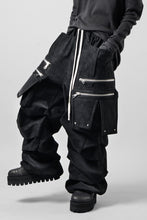 Load image into Gallery viewer, A.F ARTEFACT MULTI FLAP WIDE PANTS / WILD VEGAN LEATHER (BLACK)