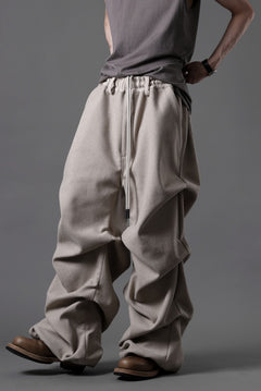 Load image into Gallery viewer, A.F ARTEFACT TUCK VOLUME BAGGY PANTS / PEs KNIT JERSEY (BEIGE)