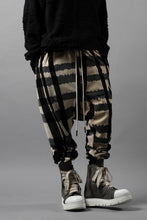 Load image into Gallery viewer, A.F ARTEFACT SAROUEL JOGGER PANTS / JACQUARD DEFORMED PLAID VELOR (BLACK x GREY x IVORY)