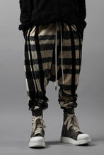 Load image into Gallery viewer, A.F ARTEFACT SAROUEL JOGGER PANTS / JACQUARD DEFORMED PLAID VELOR (BLACK x GREY x IVORY)