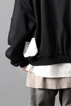 Load image into Gallery viewer, A.F ARTEFACT REVERSIBLE MA-1 HOODIE BLOUSON / COTTON-TERRY (BLACK)