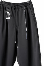 Load image into Gallery viewer, mastermind JAPAN WIDE FIT TROUSERS / HIGH END STRETCH JERSEY (BLACK)