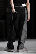 Load image into Gallery viewer, Feng Chen Wang INSIDE-OUT JEANS TROUSERS (BLACK)