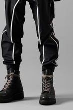 Load image into Gallery viewer, thom/krom DROP CROTCH TROUSERS / ELASTIC NYLON + REFLECTION PIPING (BLACK)