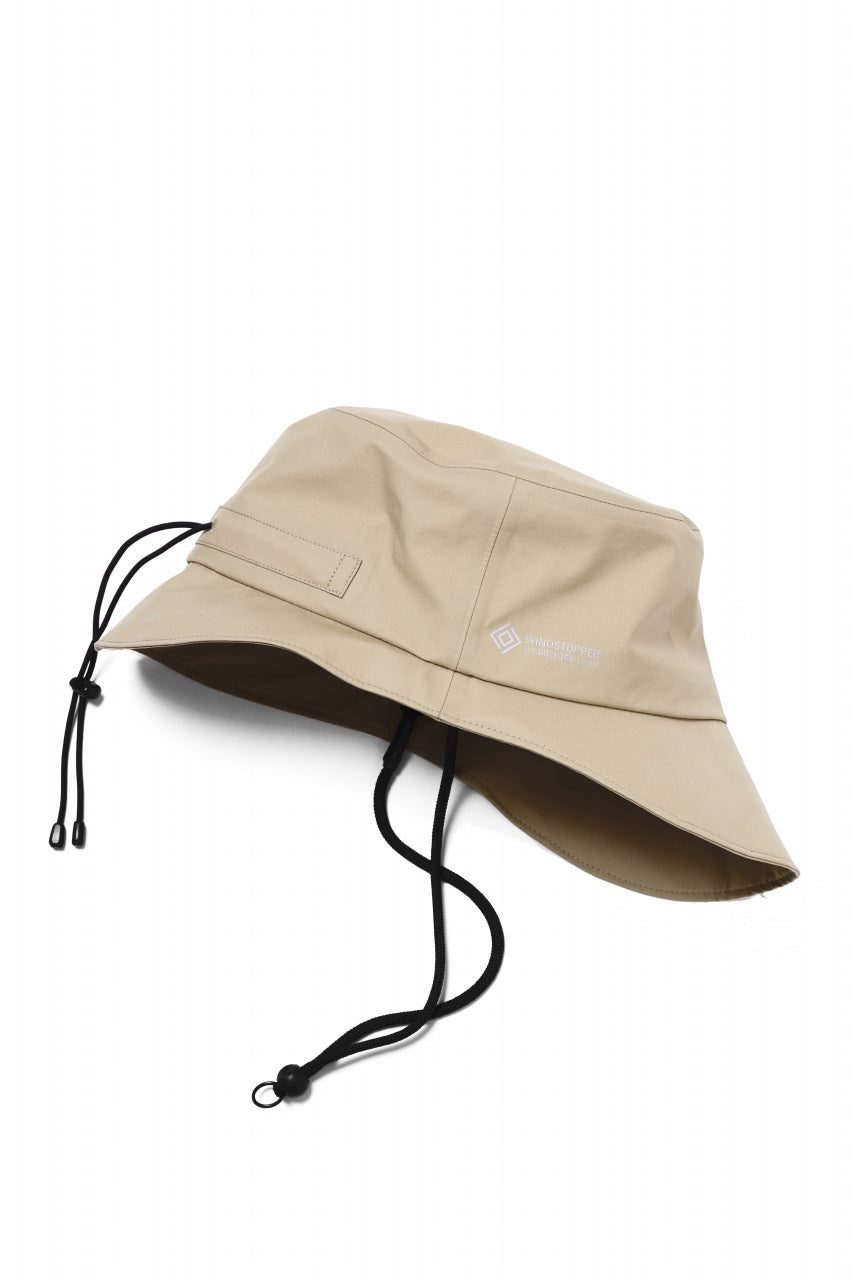 D-VEC x ALMOSTBLACK BUCKET HAT / WINDSTOPPER BY GORE-TEX LABS 3L S.D.G. (BEIGE)