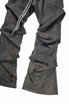 Load image into Gallery viewer, A.F ARTEFACT TUCKED DRAPE PANTS / BLENDED SHADES DENIM (D.VERDIGRIS)