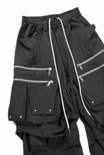 Load image into Gallery viewer, A.F ARTEFACT MULTI FLAP WIDE PANTS / TECH SMOOTH (BLACK)