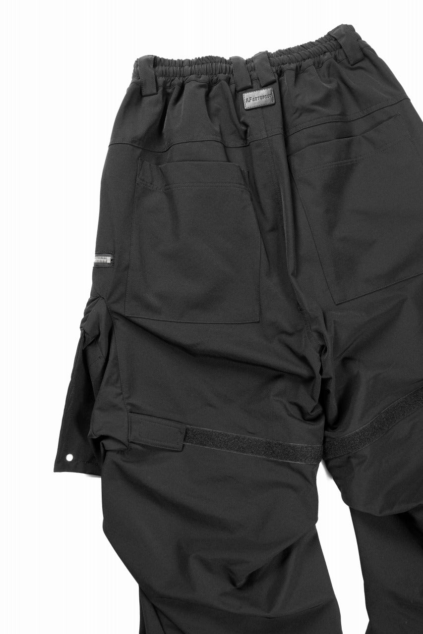 A.F ARTEFACT MULTI FLAP WIDE PANTS / TECH SMOOTH (BLACK) | エー