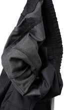 Load image into Gallery viewer, A.F ARTEFACT SARROUEL FLARE PANTS / TECH SMOOTH BONDING LW FLEECE (BLACK)