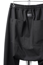 Load image into Gallery viewer, A.F ARTEFACT SARROUEL FLARE PANTS / TECH SMOOTH BONDING LW FLEECE (BLACK)