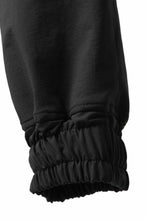 Load image into Gallery viewer, A.F ARTEFACT FRONT ZIP SAROUEL EASY PANTS / STRETCH NYLON (BLACK)