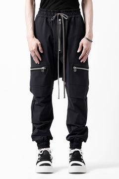 Load image into Gallery viewer, A.F ARTEFACT FRONT ZIP SAROUEL EASY PANTS / STRETCH NYLON (BLACK)