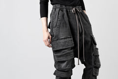 Load image into Gallery viewer, A.F ARTEFACT EASY SARROUEL MILITARY POCKET PANTS / FADED AGEING DENIM (BLACK)