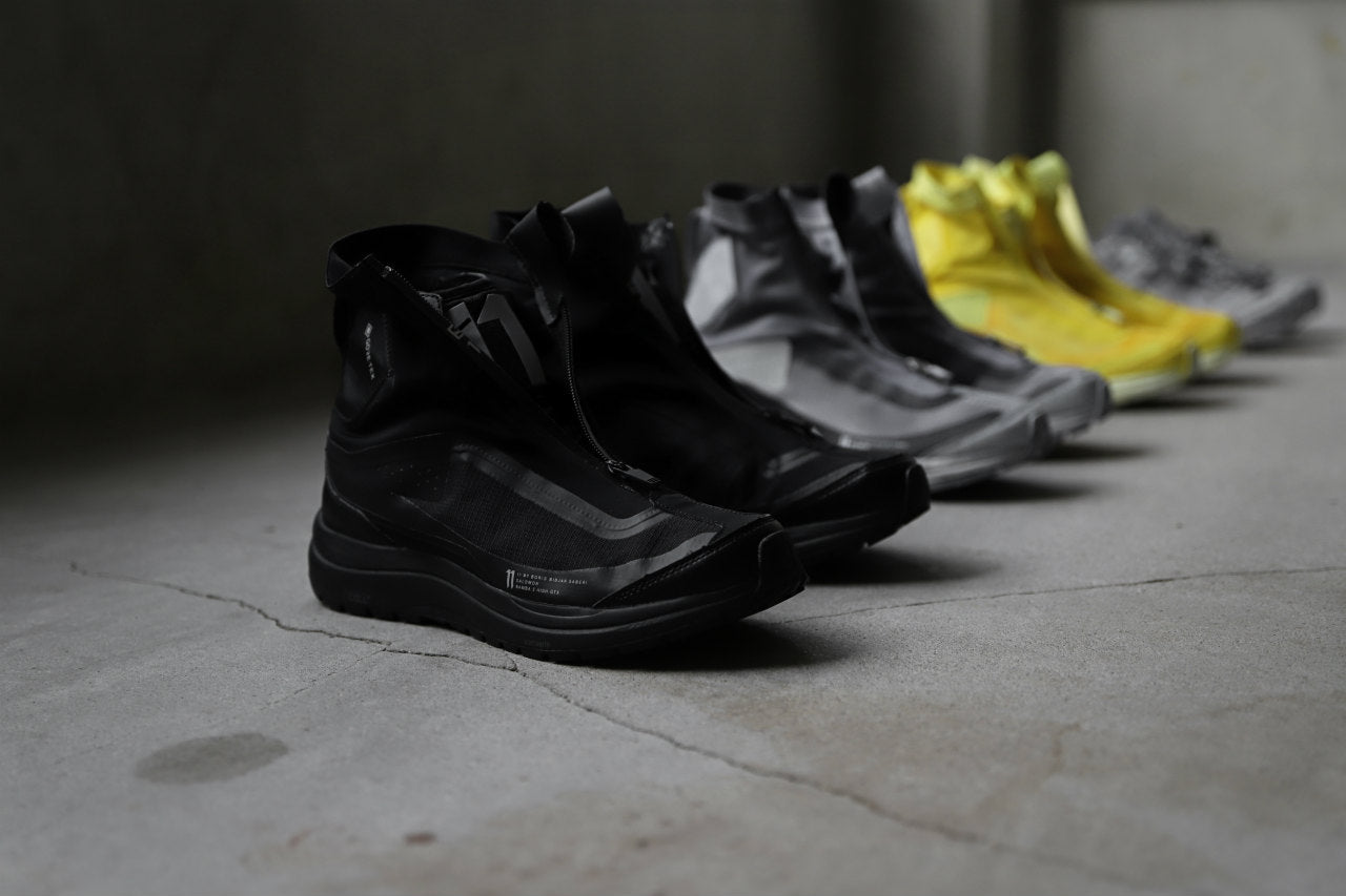 11 BY BORIS BIDJAN SABERI x SALOMON "BAMBA 2 HIGH" (OBJECT DYED YELLOW)