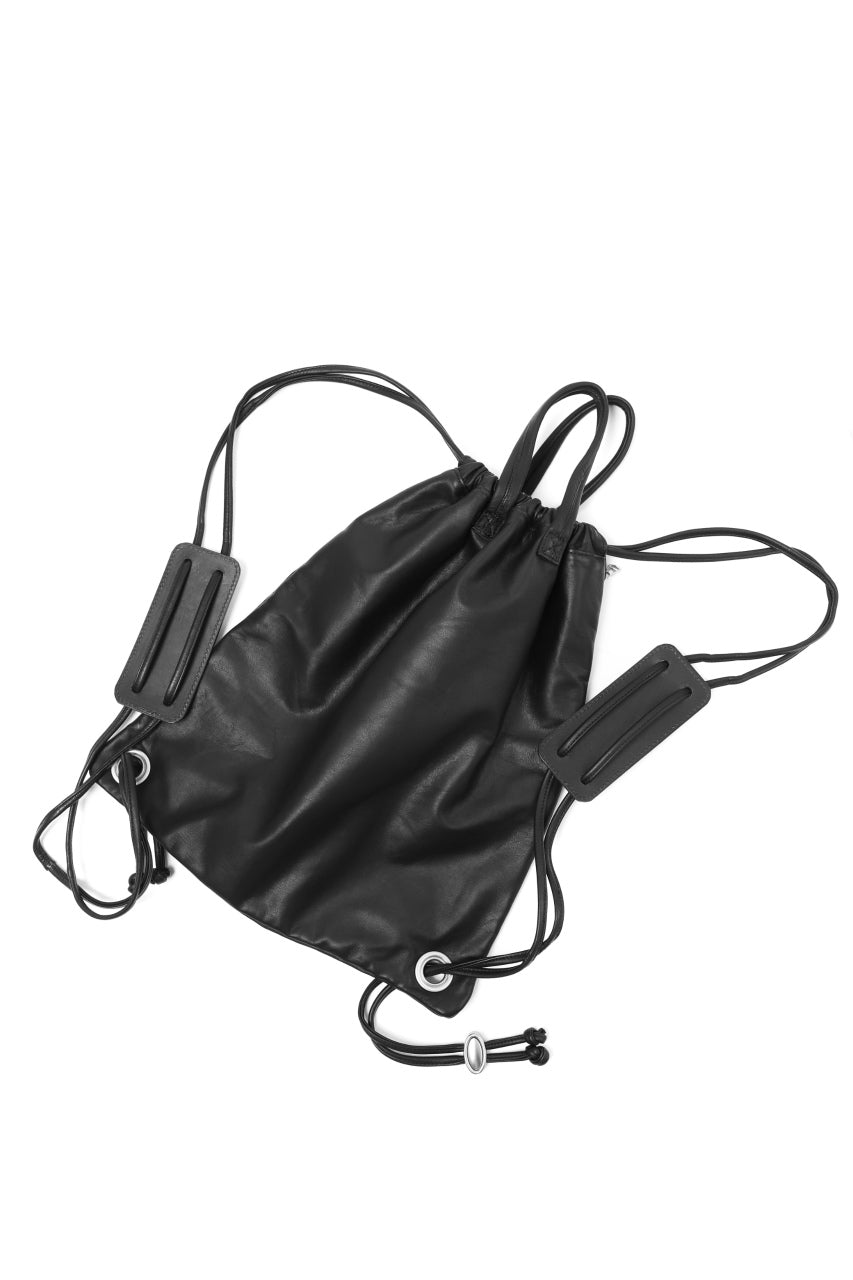 ISAMU KATAYAMA BACKLASH DRAWSTRING BACKPACK / MONOCHROME LUXURY STEER (BLACK)