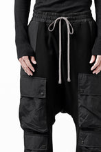 Load image into Gallery viewer, A.F ARTEFACT MILITARY CARGO SARROUEL PANTS / BOMBER HEAT® + NYLON (BLACK)